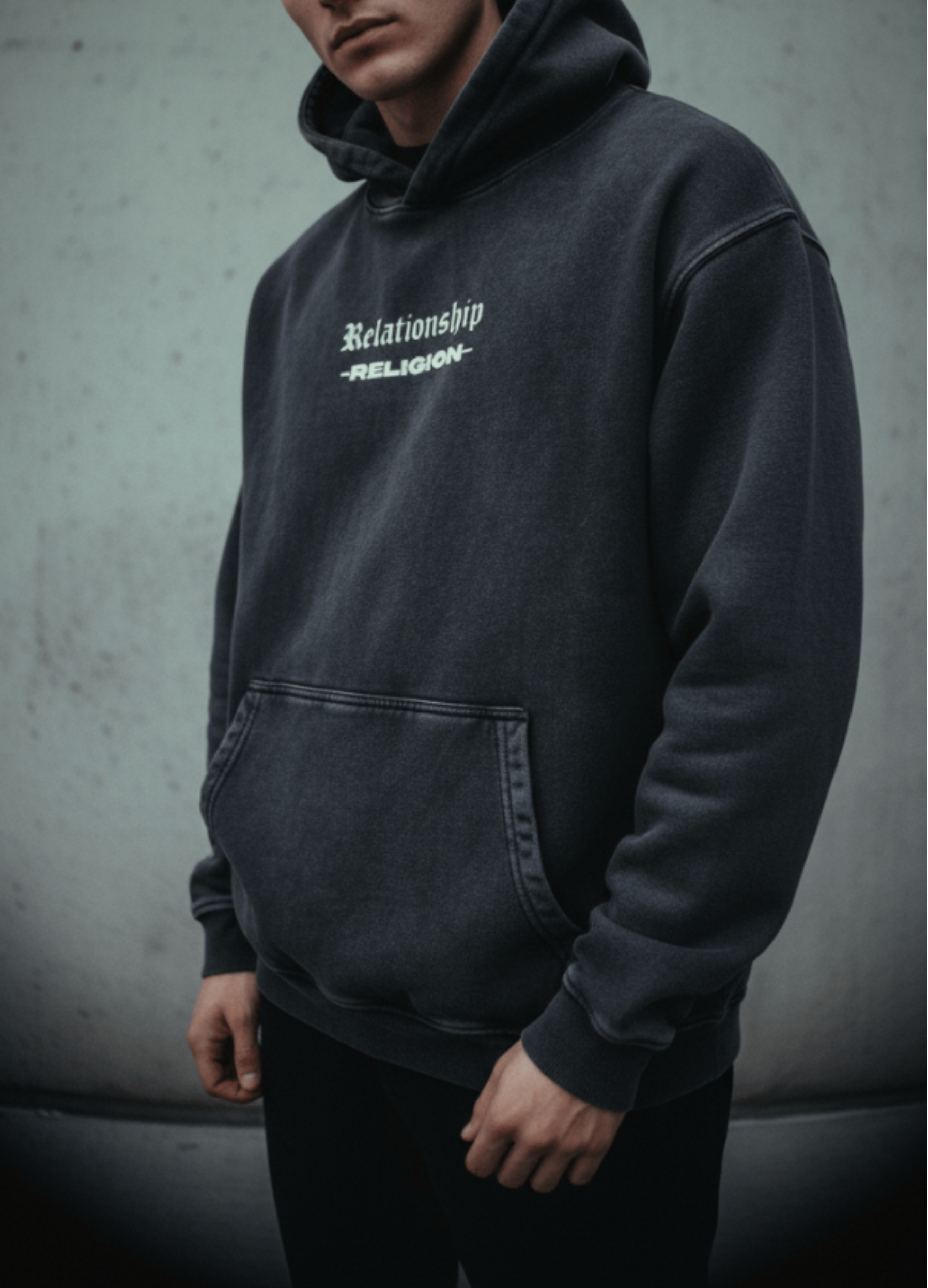 "ABOVE RELIGION" OVERSIZED LUXE HOODIE IN ACID WASHED BLACK