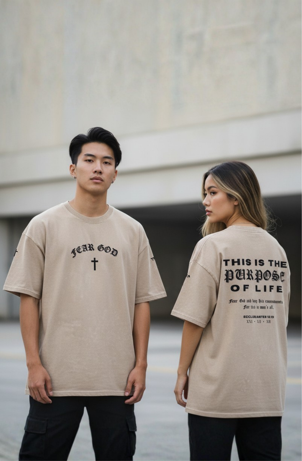 Man and woman wearing FEAR GOD Christian streetwear tees, urban lifestyle shot