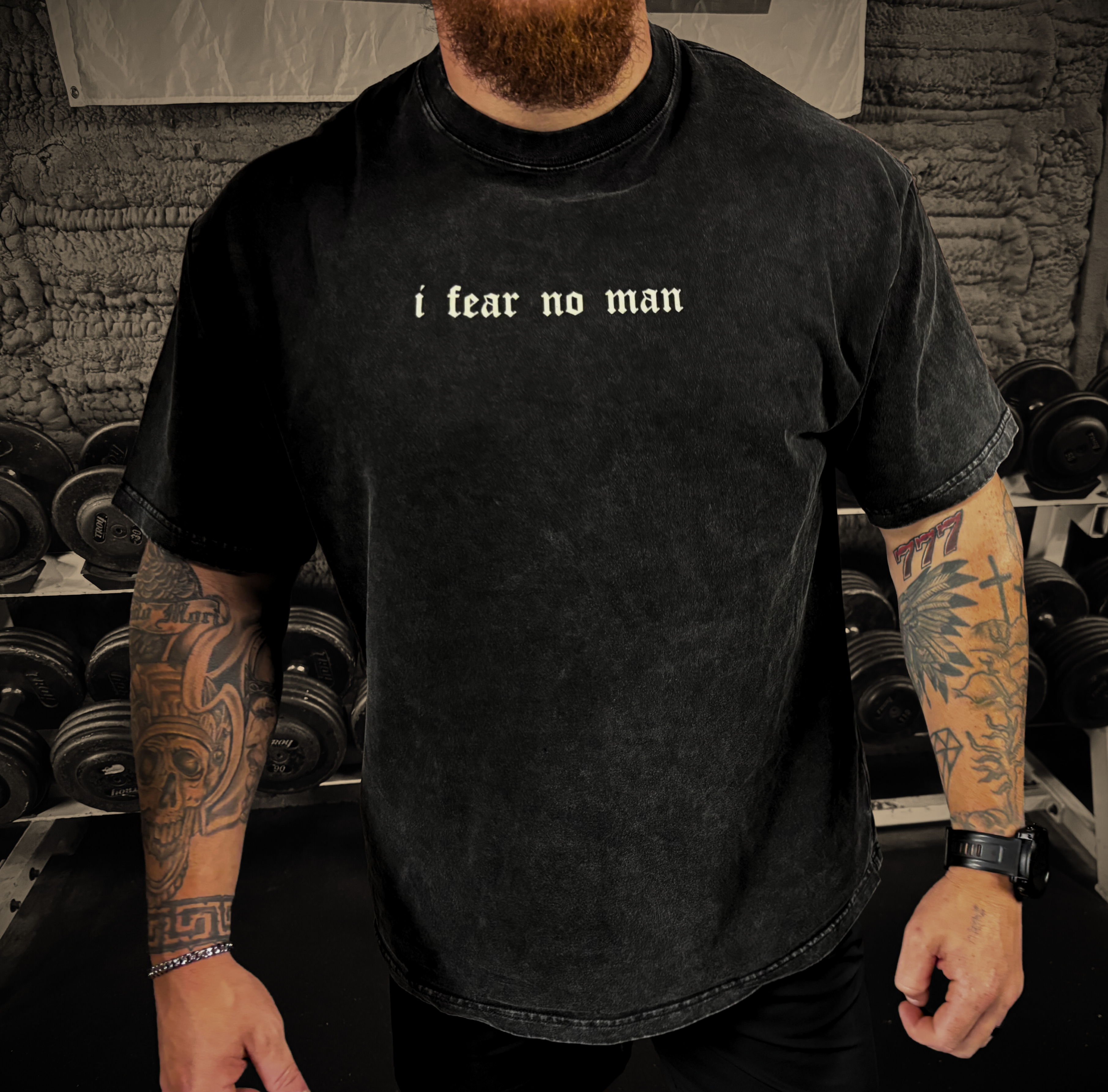 Close-up of man wearing FEARLESS FAITH Christian tee, "i fear no man" front print