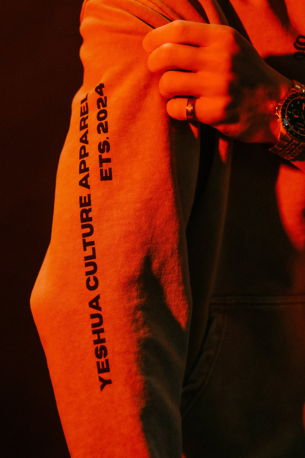Sleeve text detail reading "Yeshua Culture Apparel Est. 2024" on SEEK WISDOM hoodie